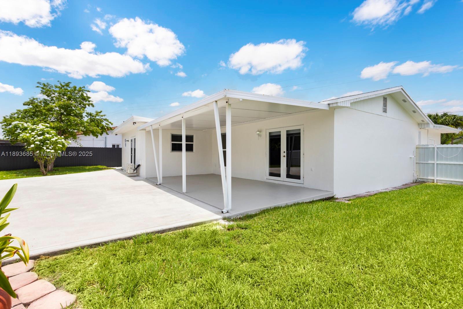 10770 Southwest 26th Street Miami, FL 33165 - Photo 31 of 35 a view of a backyard of the house
