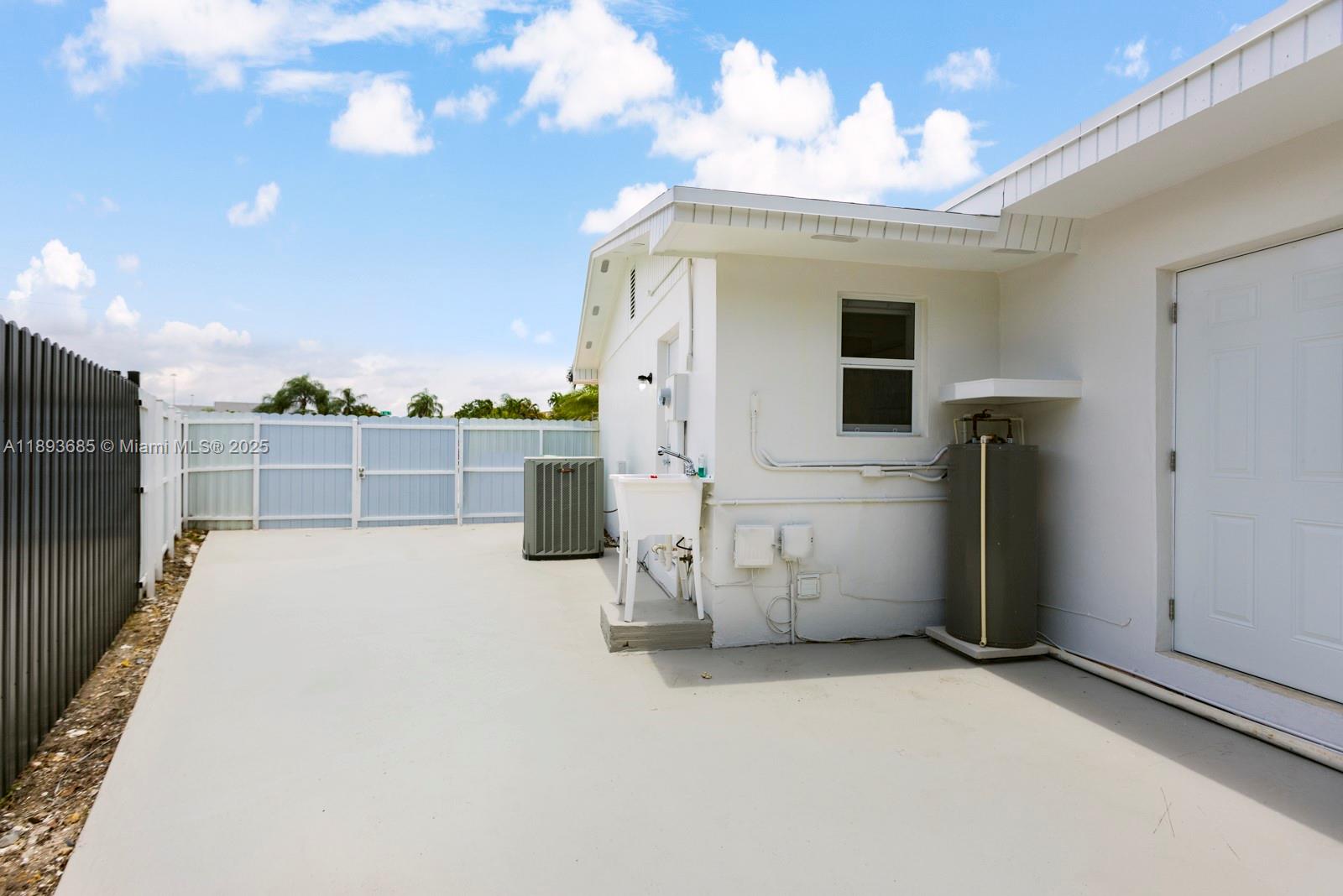 10770 Southwest 26th Street Miami, FL 33165 - Photo 33 of 35 a view of a storage & utility room