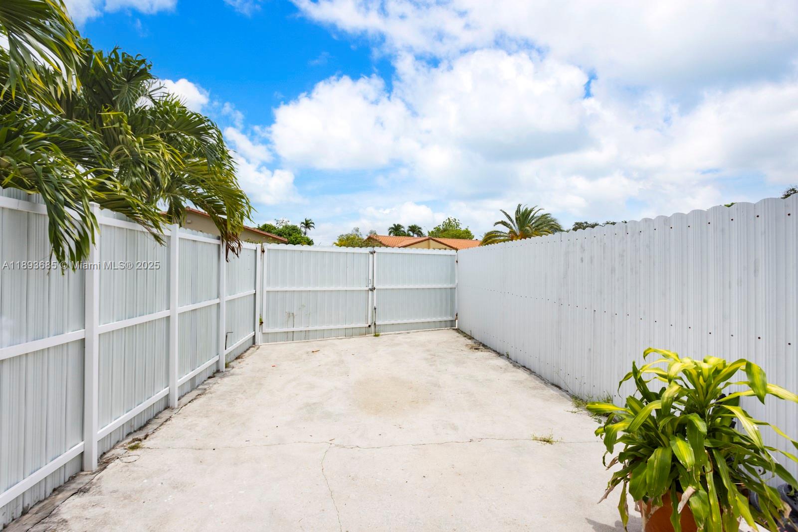 10770 Southwest 26th Street Miami, FL 33165 - Photo 35 of 35 a backyard of a house