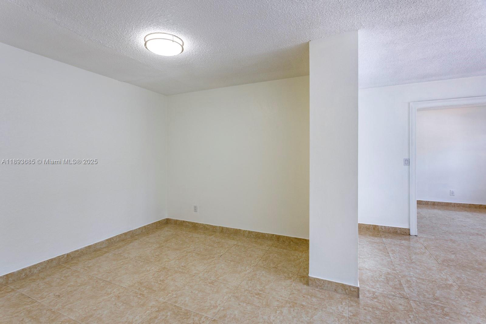 10770 Southwest 26th Street Miami, FL 33165 - Photo 7 of 35 a view of an empty room