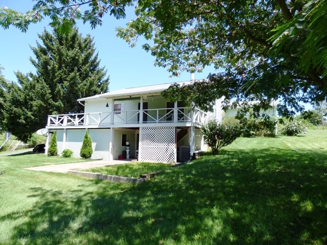 660 Ladd Road Fishersville, VA 22939 - Photo 1 of 40 a view of a house with a big yard