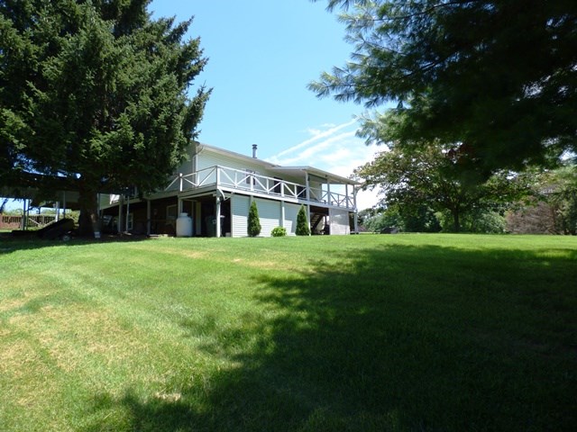 660 Ladd Road Fishersville, VA 22939 - Photo 2 of 40 a front view of a house with a yard