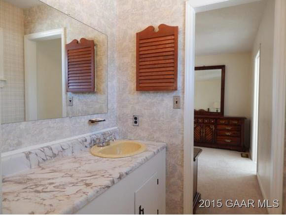 660 Ladd Road Fishersville, VA 22939 - Photo 24 of 40 a bathroom with a sink and a mirror