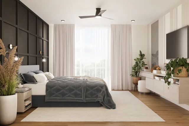 a bedroom with a large bed and a flat tv screen