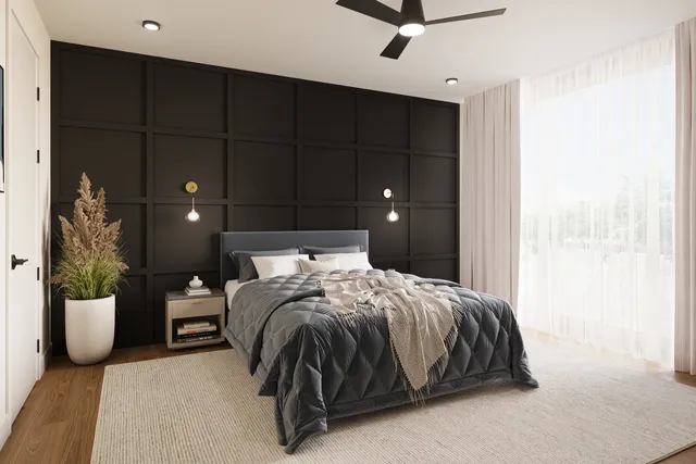 a bedroom with a bed and window