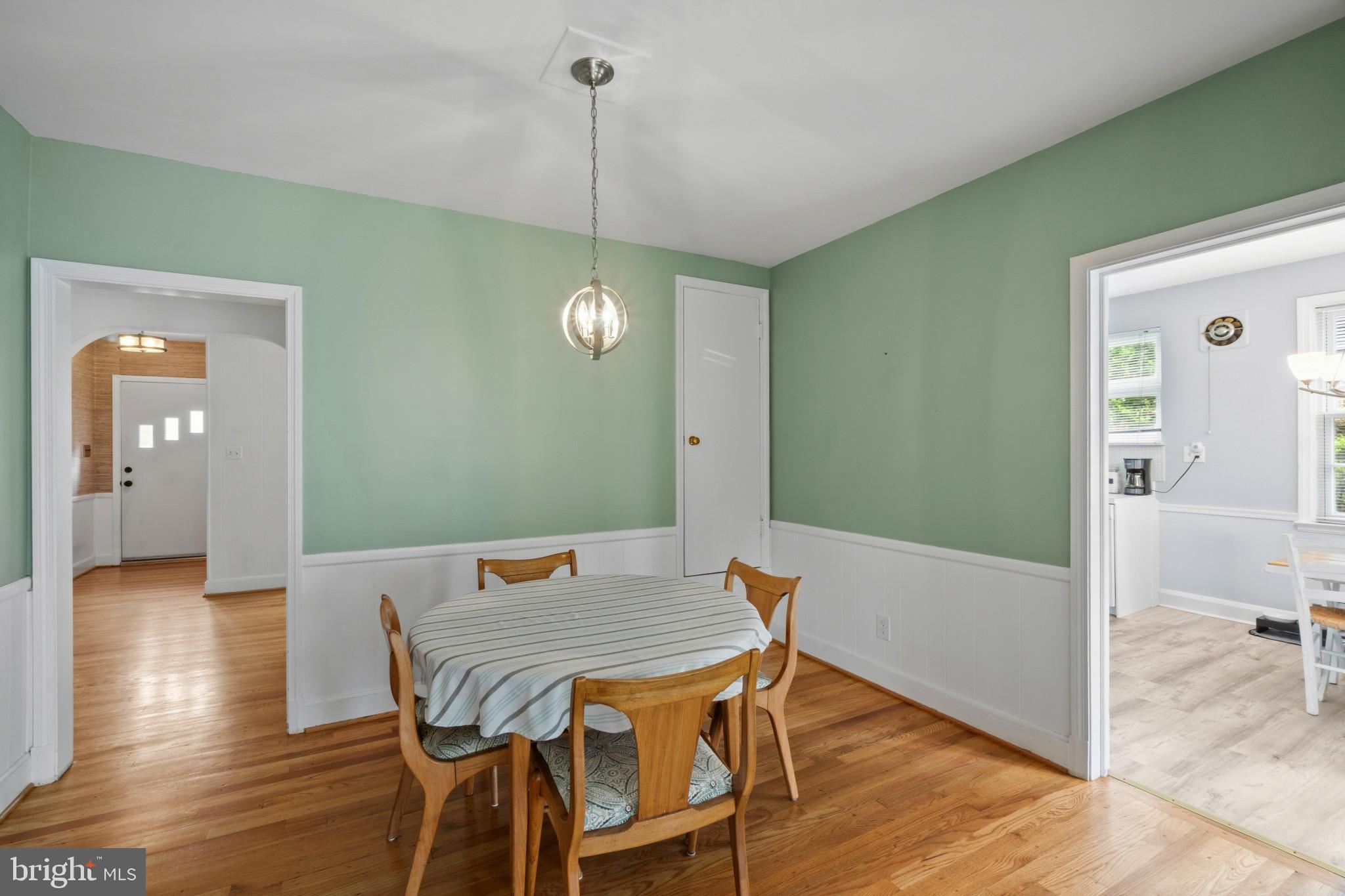 909 Weatherbee Road Towson, MD 21286 - Photo 13 of 51 a view of a dining room with furniture and wooden floor