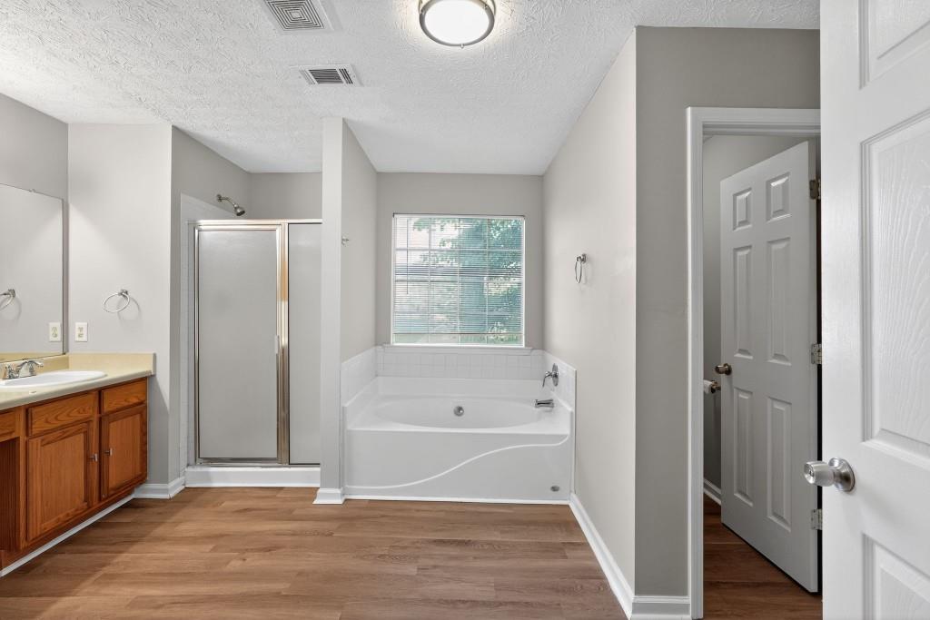 3737 Waldrop Road Decatur, GA 30034 - Photo 17 of 23 a bathroom with a tub shower sink and mirror