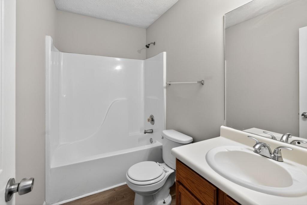 3737 Waldrop Road Decatur, GA 30034 - Photo 20 of 23 a bathroom with a sink toilet and shower