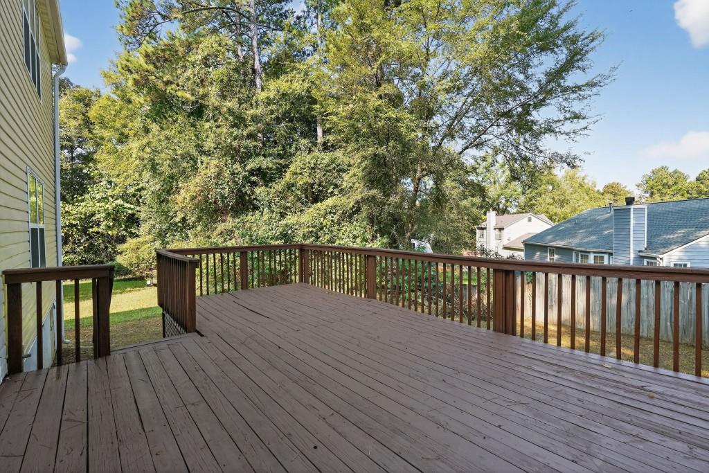 3737 Waldrop Road Decatur, GA 30034 - Photo 5 of 23 a view of balcony with wooden floor and fence