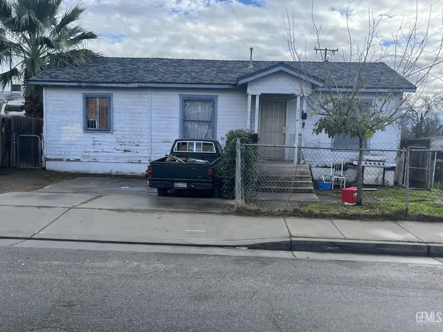 a front view of a house with garage