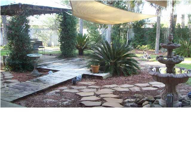 4496 Woodbridge Road Niceville, FL 32578 - Photo 23 of 25 a view of a backyard