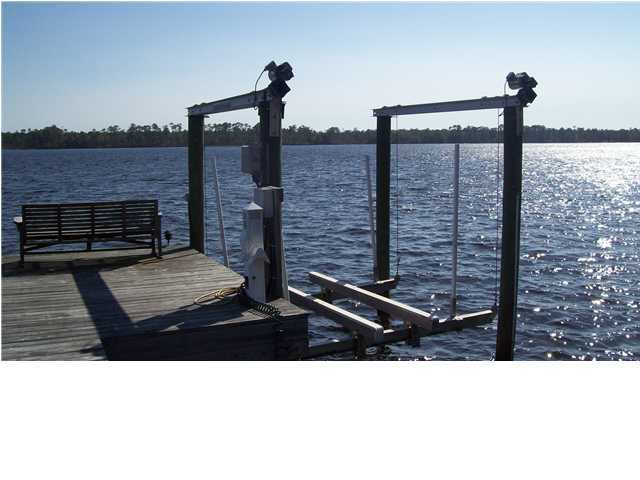 4496 Woodbridge Road Niceville, FL 32578 - Photo 6 of 25 a black and white photo of a