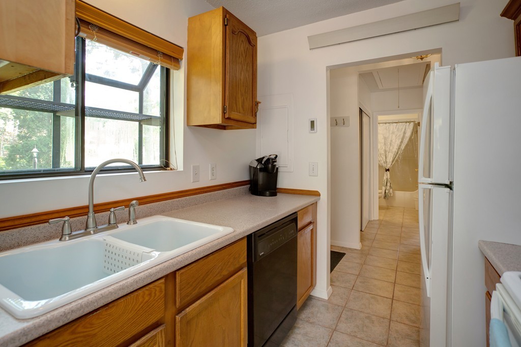 20 Round House Road, Unit 20 Bourne, MA 02532 - Photo 14 of 22 a kitchen with a sink and a window