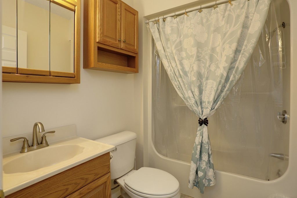 20 Round House Road, Unit 20 Bourne, MA 02532 - Photo 20 of 22 a bathroom with a sink a toilet and tub