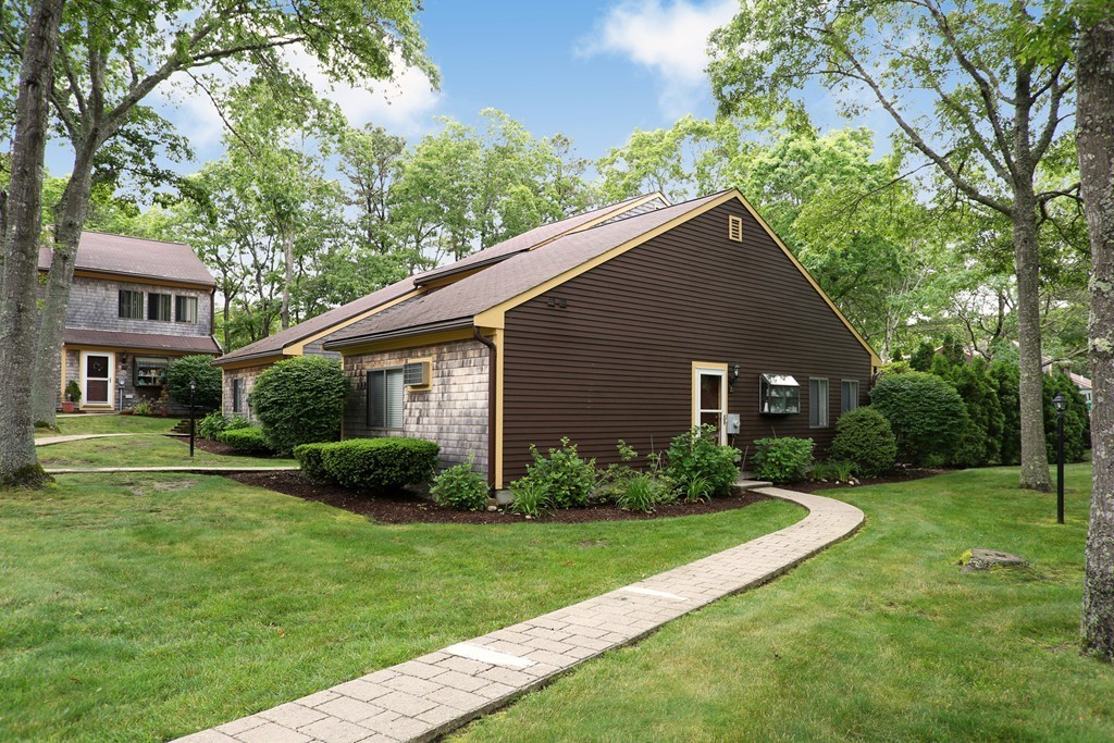20 Round House Road, Unit 20 Bourne, MA 02532 - Photo 6 of 22 a view of a yard in front of house