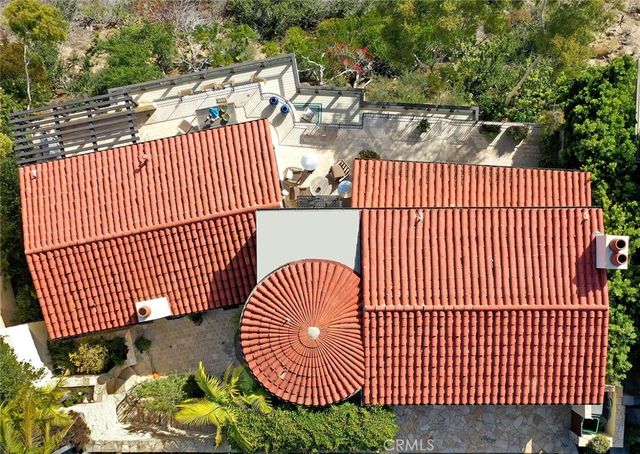 a view of barbeque area with wooden fence