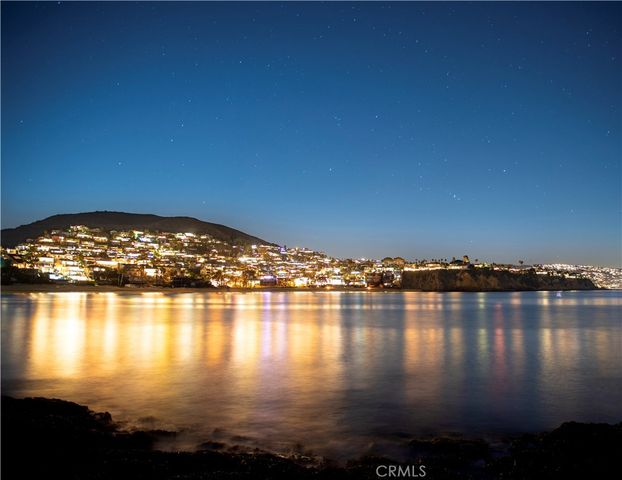 a view of swimming pool and an ocean view