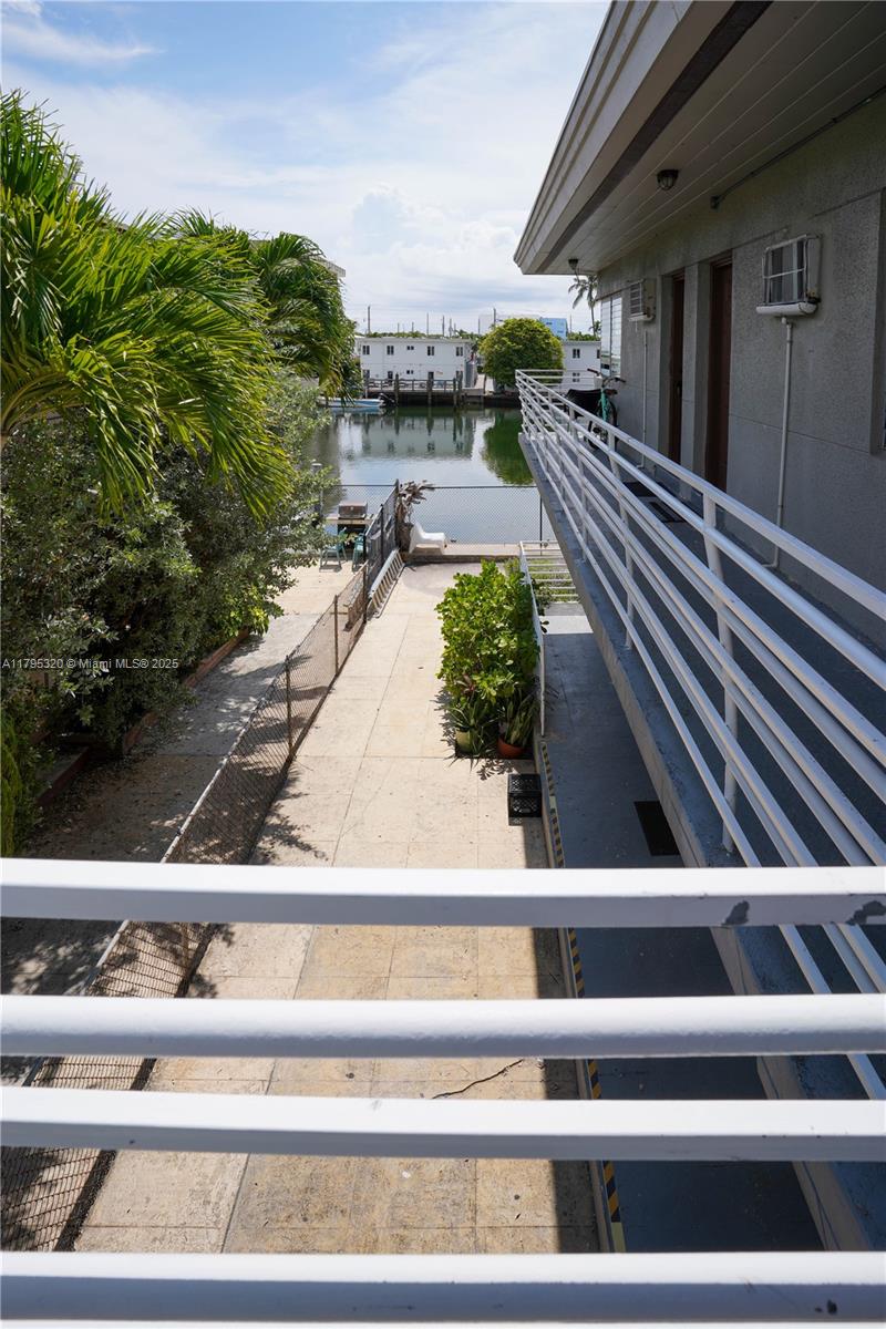 8321 Crespi Boulevard, Unit 1 Miami Beach, FL 33141 - Photo 13 of 15 a view of balcony with furniture