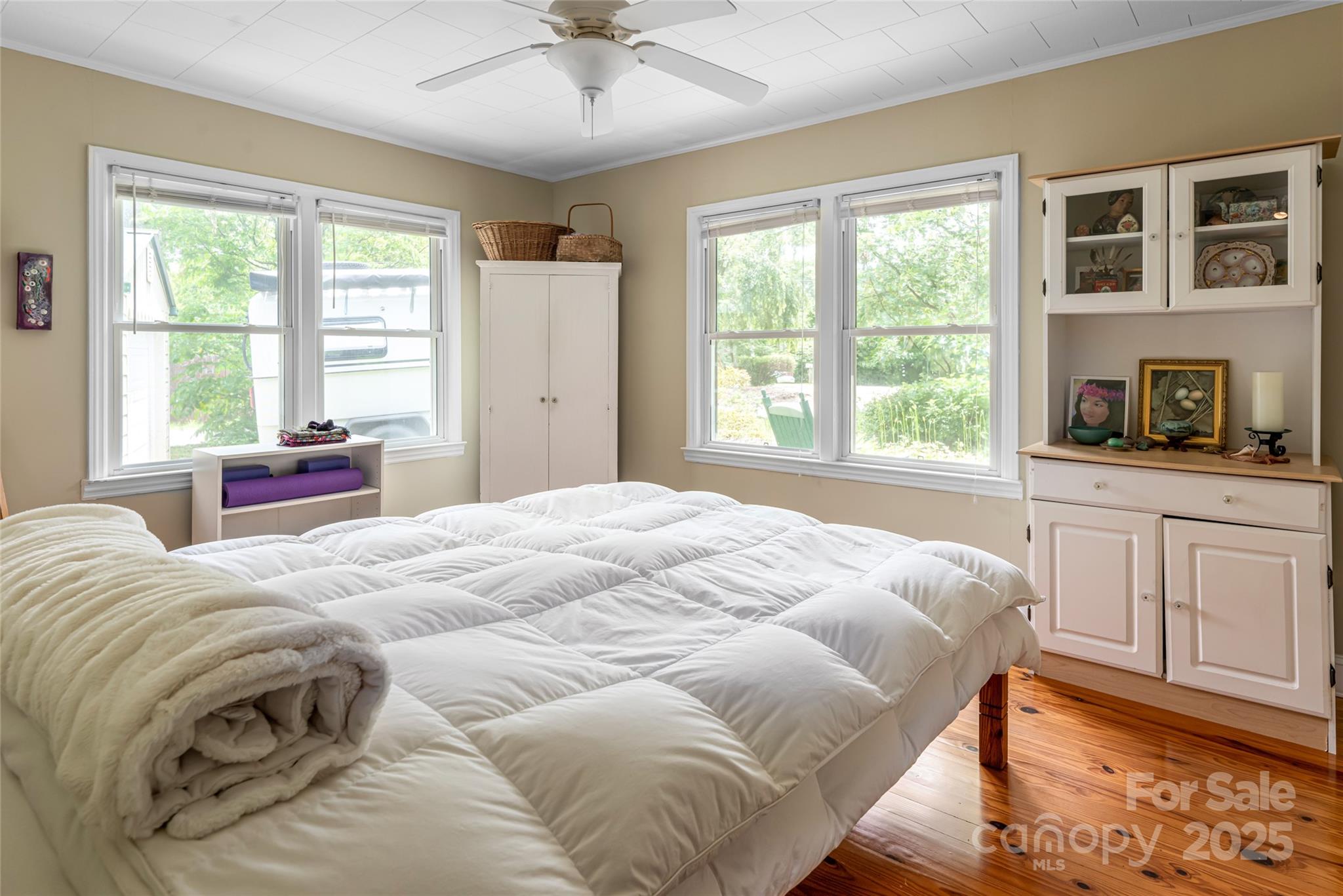 75 Cisco Road Asheville, NC 28805 - Photo 16 of 47 a bedroom with a bed and a window