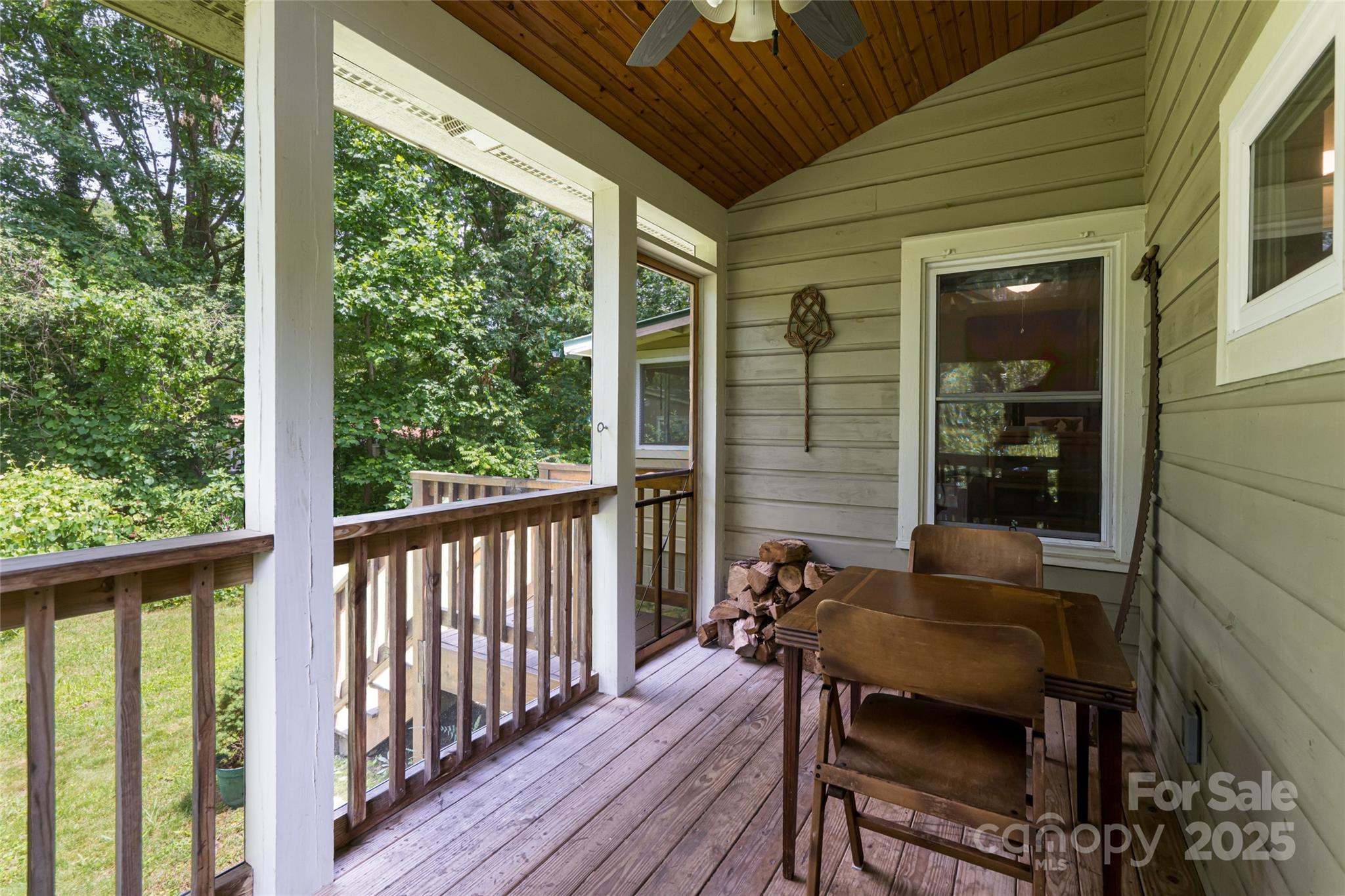 75 Cisco Road Asheville, NC 28805 - Photo 17 of 47 a view of a two chair in the balcony
