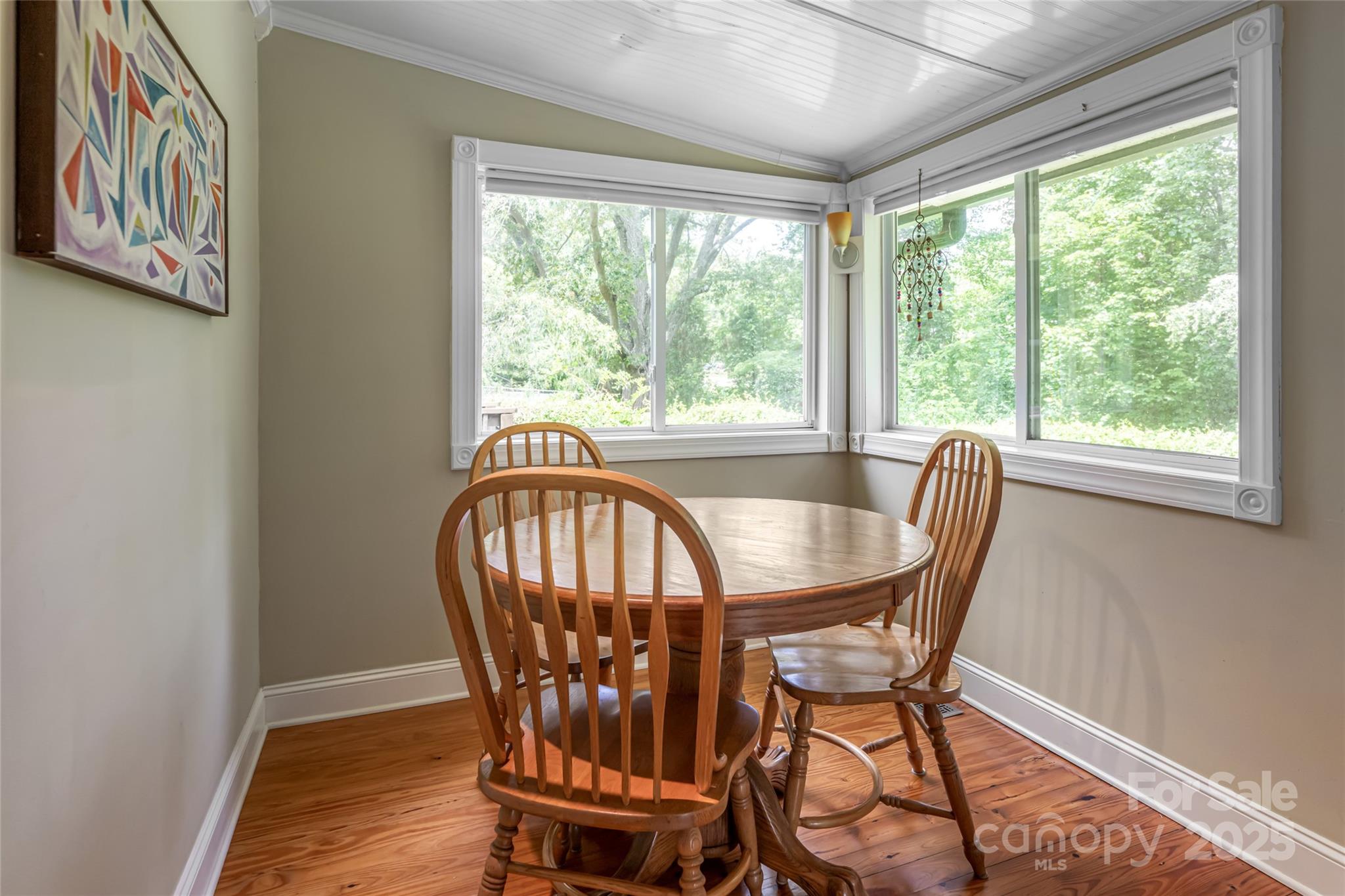 75 Cisco Road Asheville, NC 28805 - Photo 31 of 47 a view of a dining room with furniture window and wooden floor