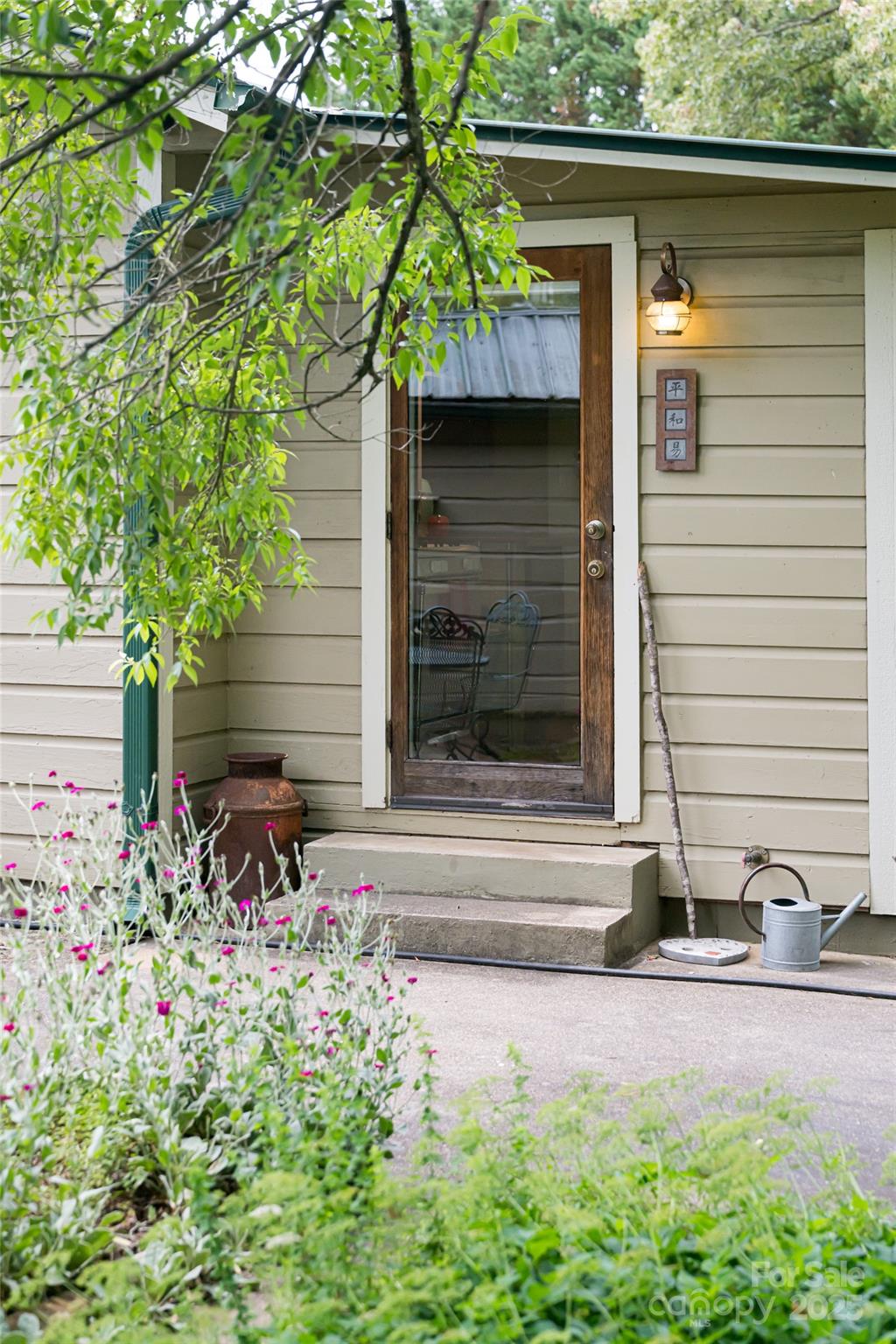 75 Cisco Road Asheville, NC 28805 - Photo 40 of 47 a small hut with trees in the background