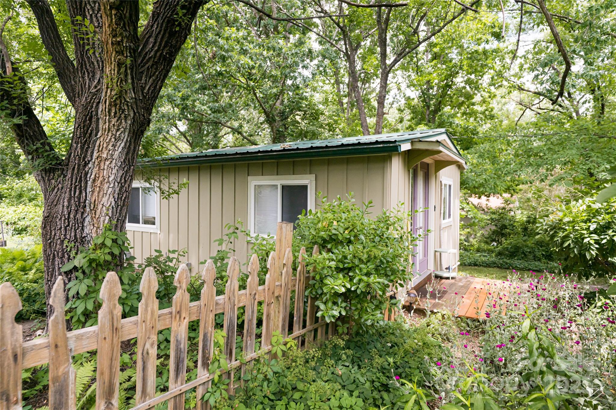75 Cisco Road Asheville, NC 28805 - Photo 9 of 47 a backyard of a house with lots of green space