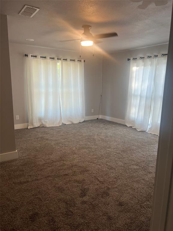 202 South 7th Street Jacksboro, TX 76458 - Photo 8 of 12 a view of an empty room and window