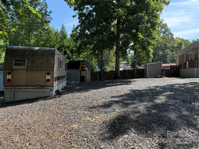 a view of a couches in the backyard of house