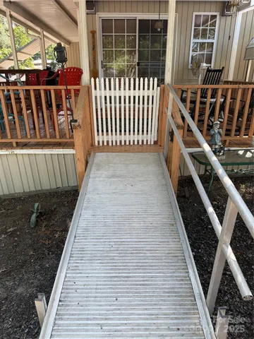 a view of a balcony with wooden floor