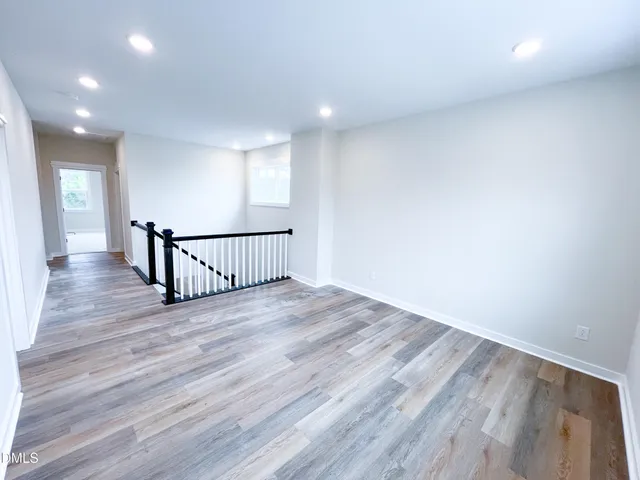 a front view of a house with a yard table and chairs
