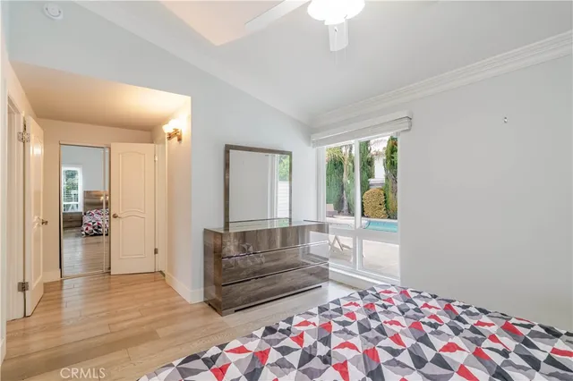 a living room with a couch and a chandelier