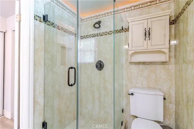 a view of backyard with patio