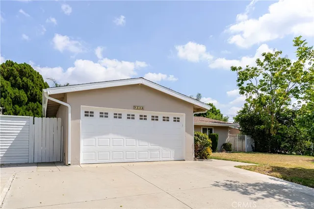 a front view of a house with a patio