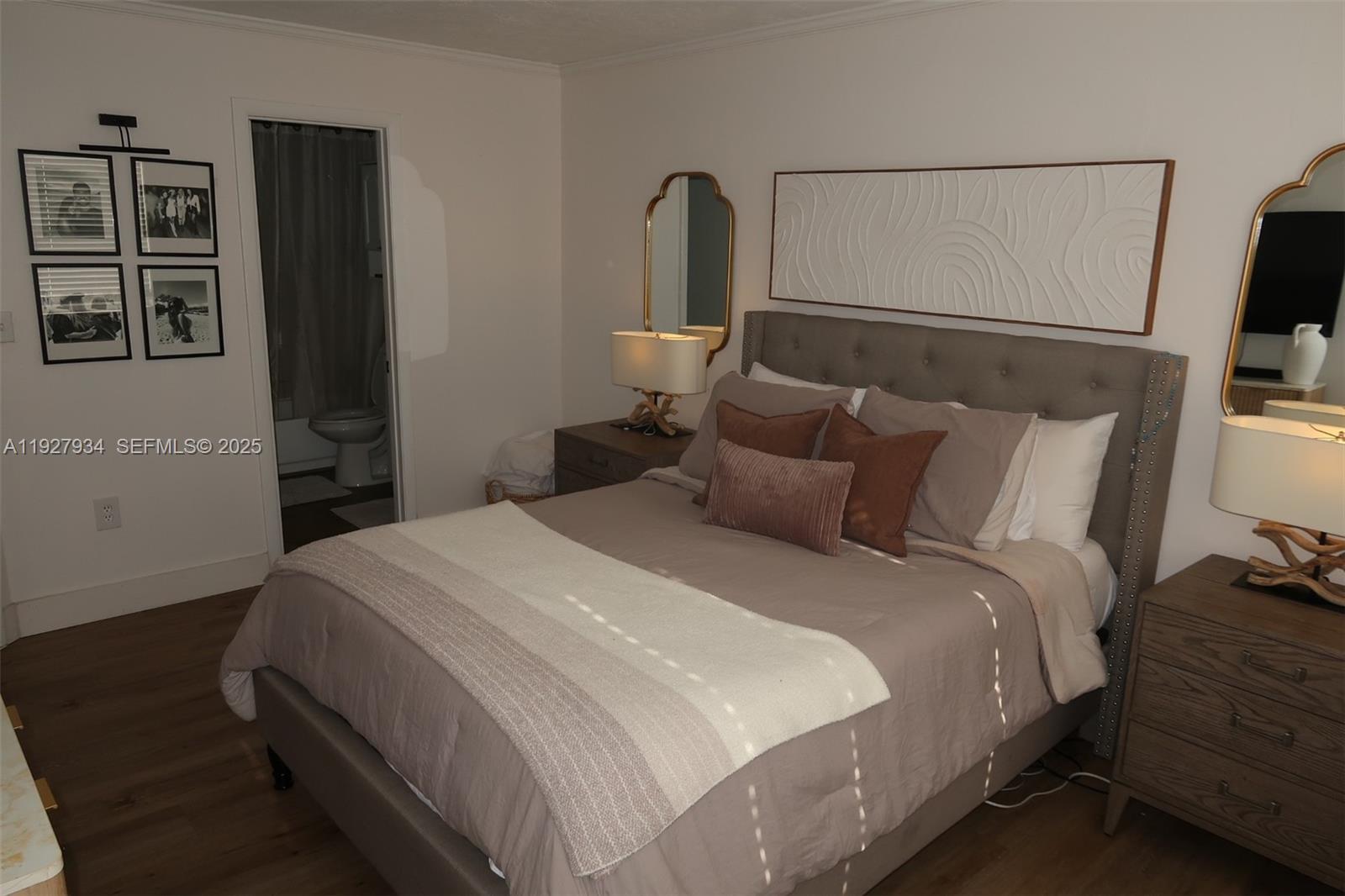 4530 Southwest 68th Ct Circle, Unit 356 Miami, FL 33155 - Photo 22 of 31 a bedroom with a bed and a flat screen tv