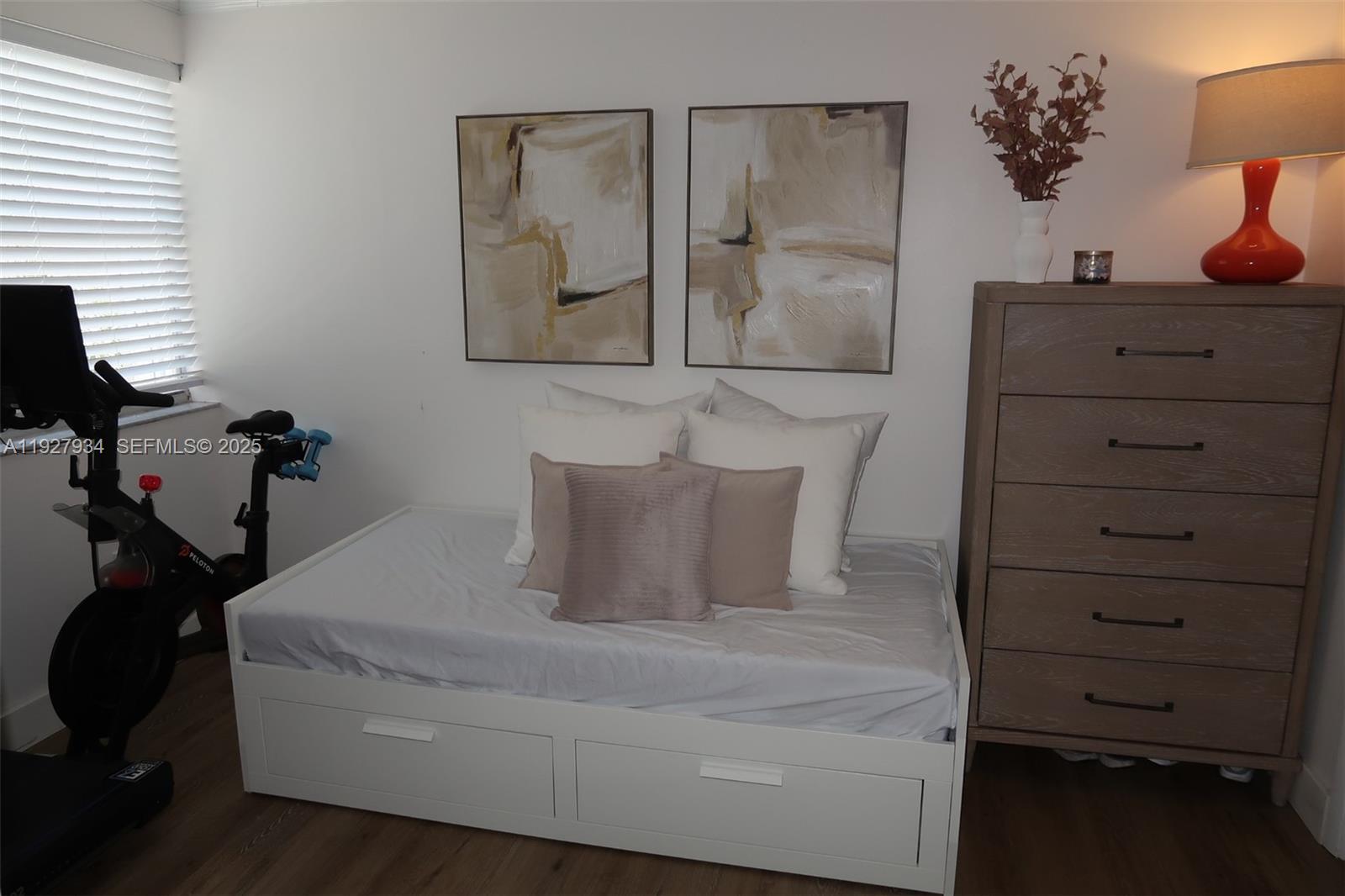 4530 Southwest 68th Ct Circle, Unit 356 Miami, FL 33155 - Photo 26 of 31 a bed room with a bed and a night stand