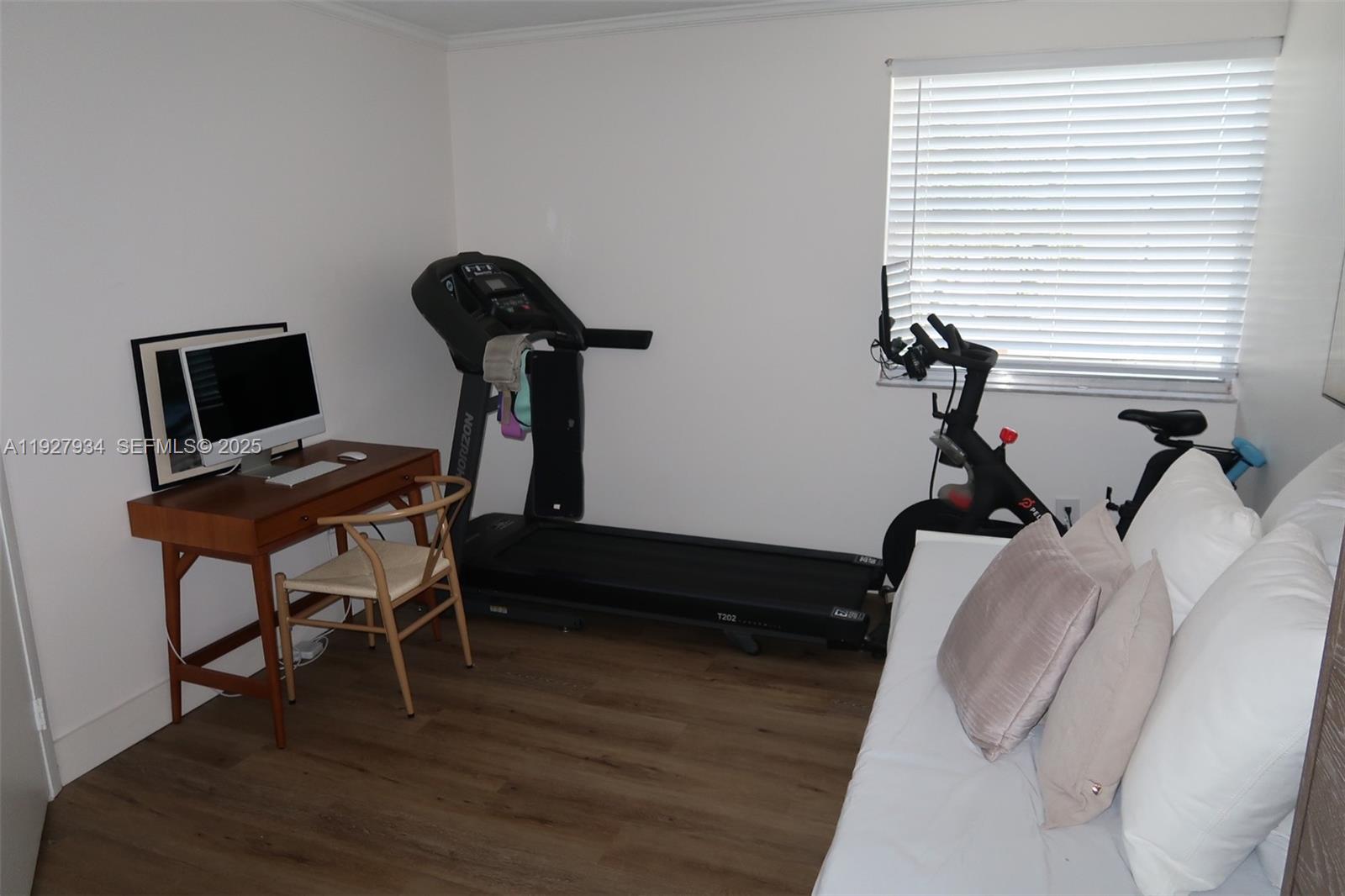 4530 Southwest 68th Ct Circle, Unit 356 Miami, FL 33155 - Photo 27 of 31 a view of workspace with wooden floor windows