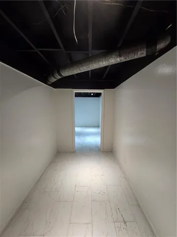 a view of a room with an empty space