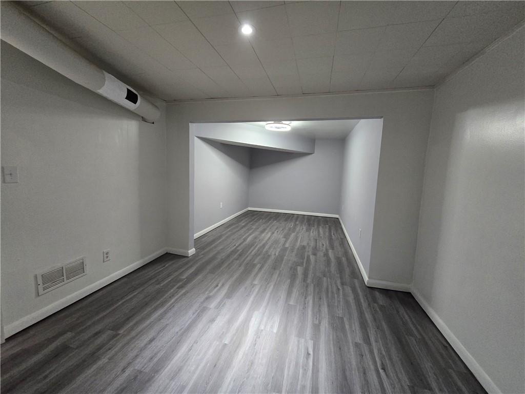 2468 Dresden Drive Northeast Atlanta, GA 30341 - Photo 20 of 26 a view of wooden floor in a room