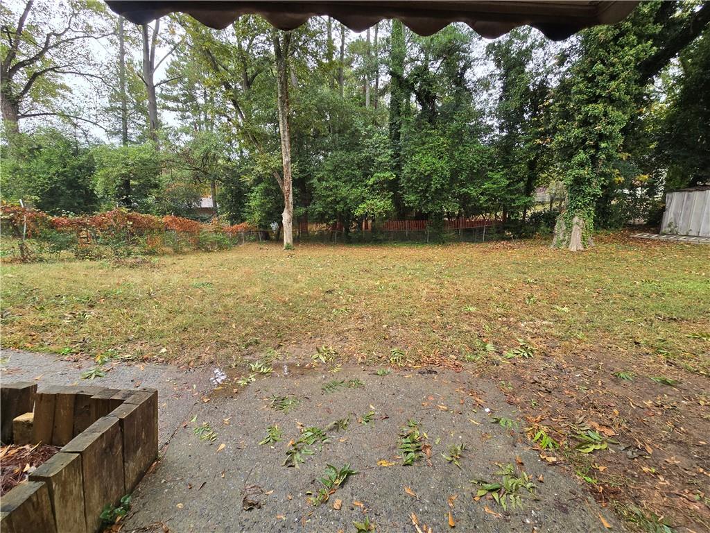 2468 Dresden Drive Northeast Atlanta, GA 30341 - Photo 23 of 26 a view of a yard with an outdoor space