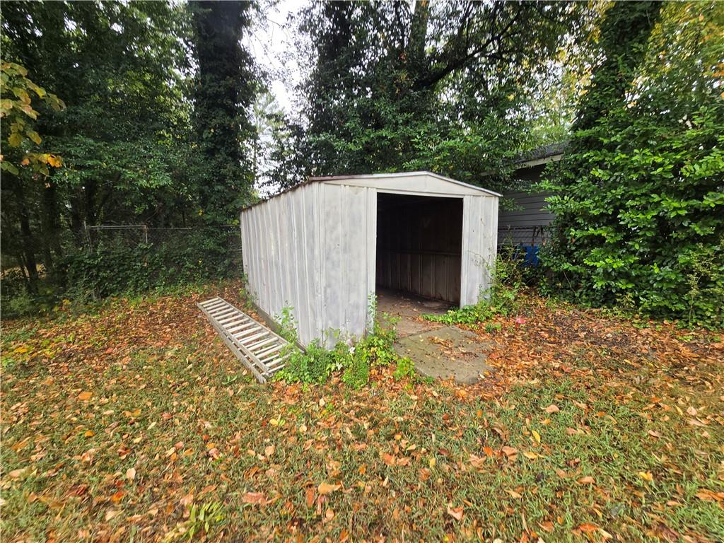 2468 Dresden Drive Northeast Atlanta, GA 30341 - Photo 24 of 26 a backyard of a house with lots of green space