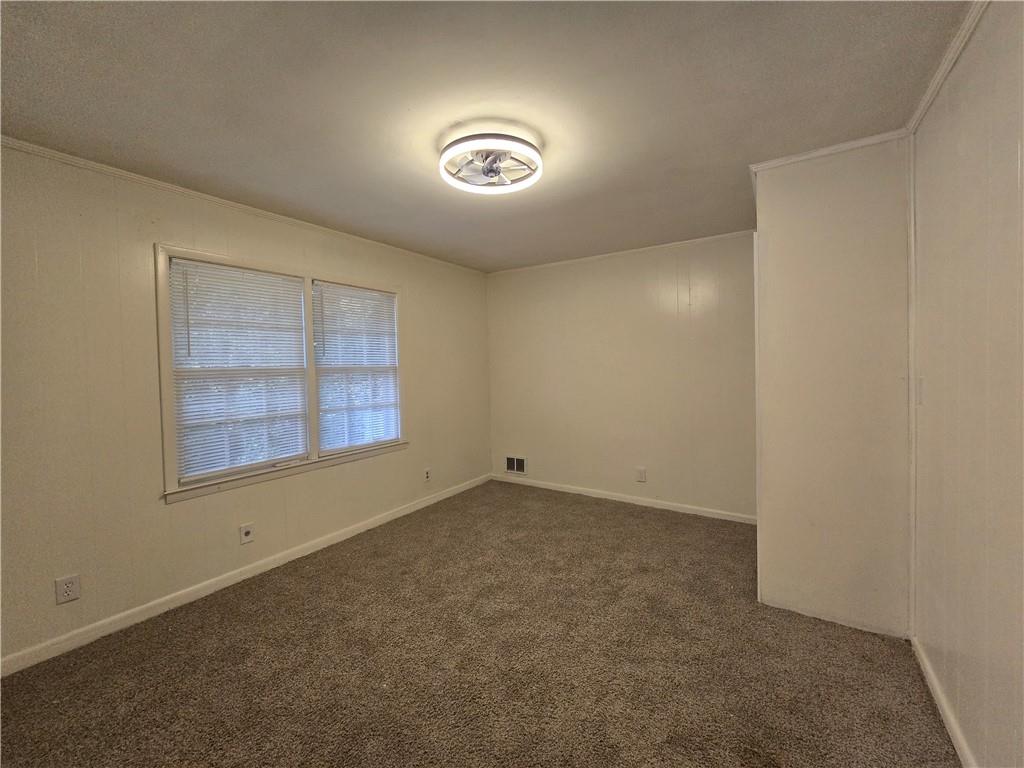 2468 Dresden Drive Northeast Atlanta, GA 30341 - Photo 9 of 26 an empty room with a window