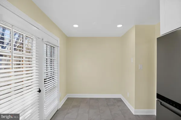 a view of hallway with a large window