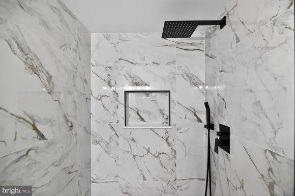 a view of bathroom with a shower