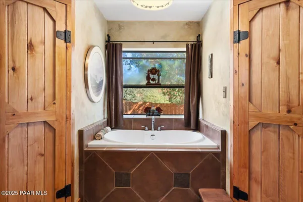 a bed room with a bed and a table