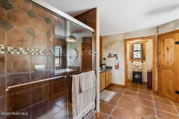 a bathroom with a sink a mirror and a toilet