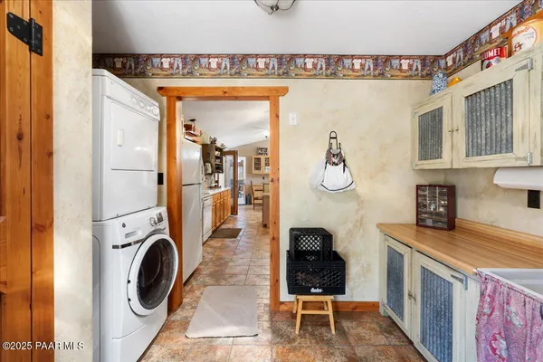 a bedroom with a bed and a table