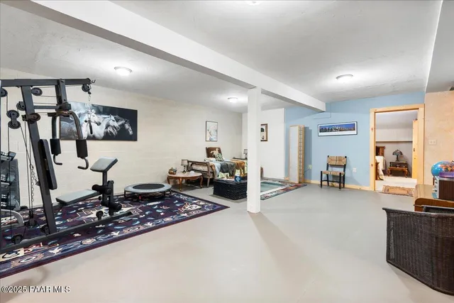 a bathroom with a shower and a toilet