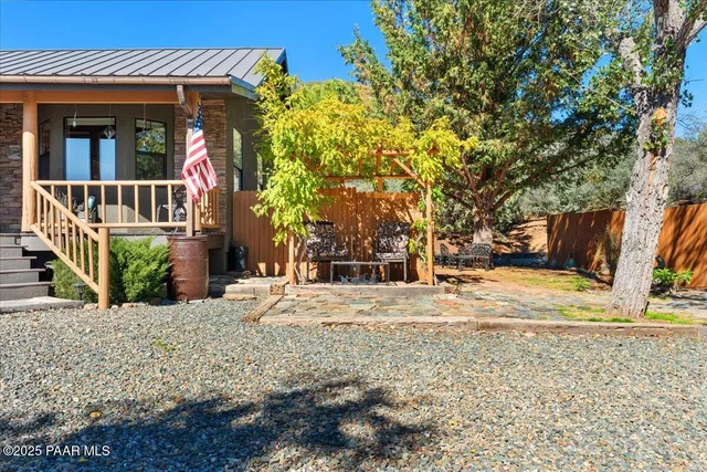 a view of a balcony with wooden floor