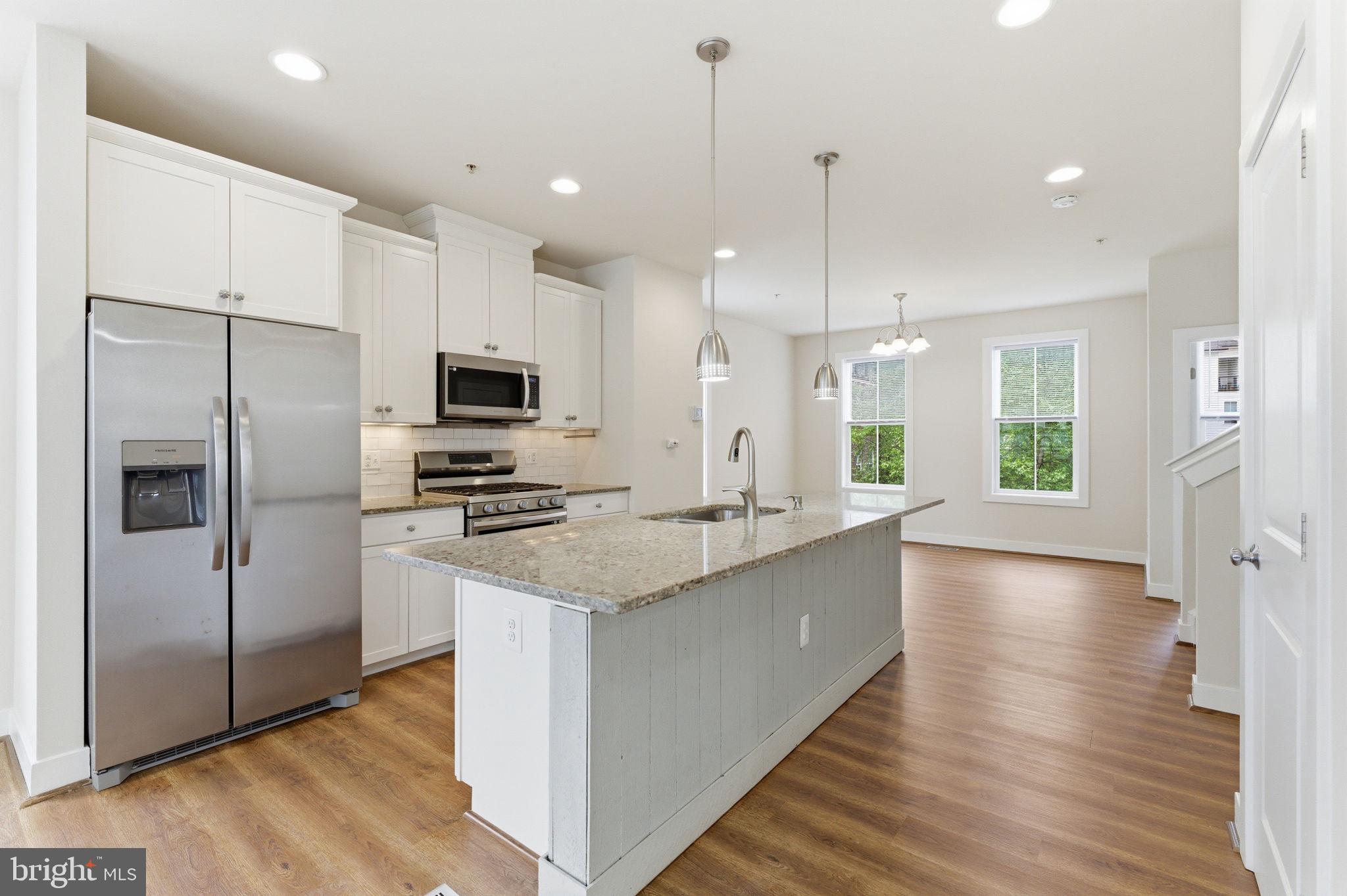 169 Kandinsky Loop Silver Spring, MD 20906 - Photo 21 of 67 Modern kitchen with sleek finishes.